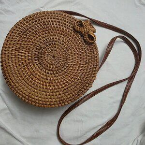 Round woven crossbody bag
